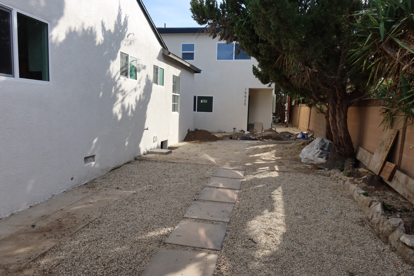 Side yard with stepping stones and landscaping