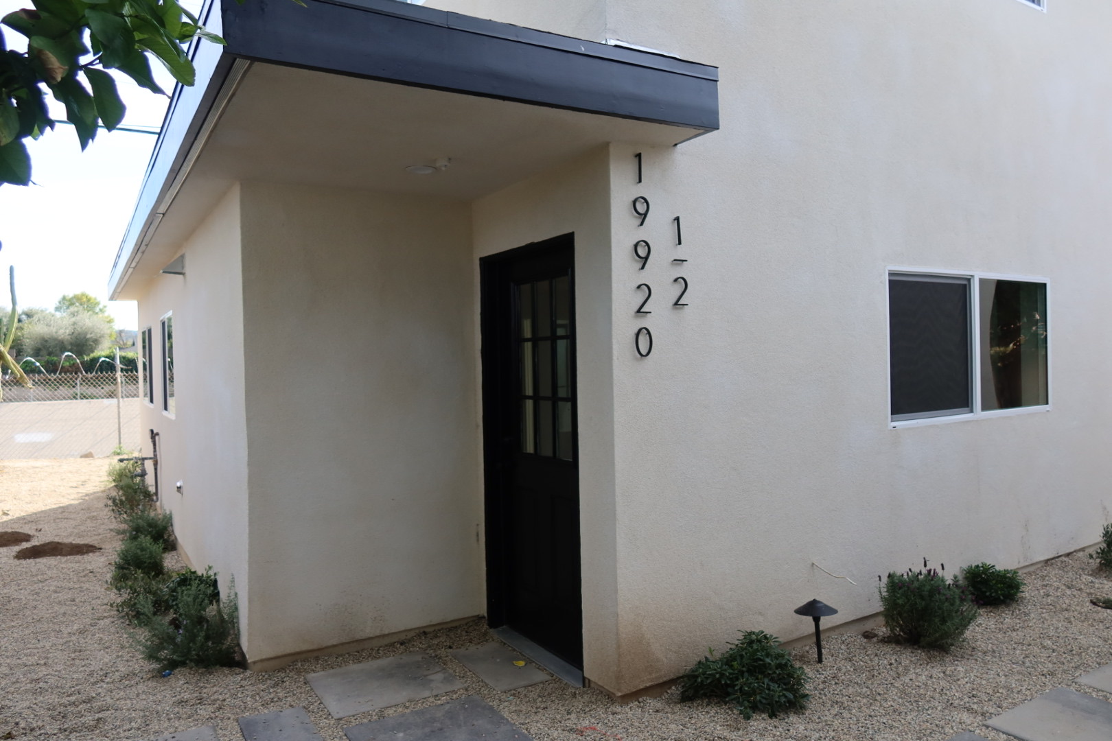 ADU exterior entrance with address numbers