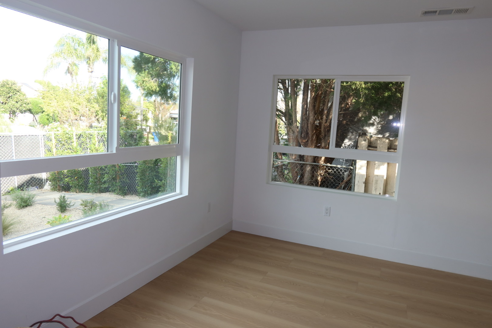 Bright bedroom with large windows