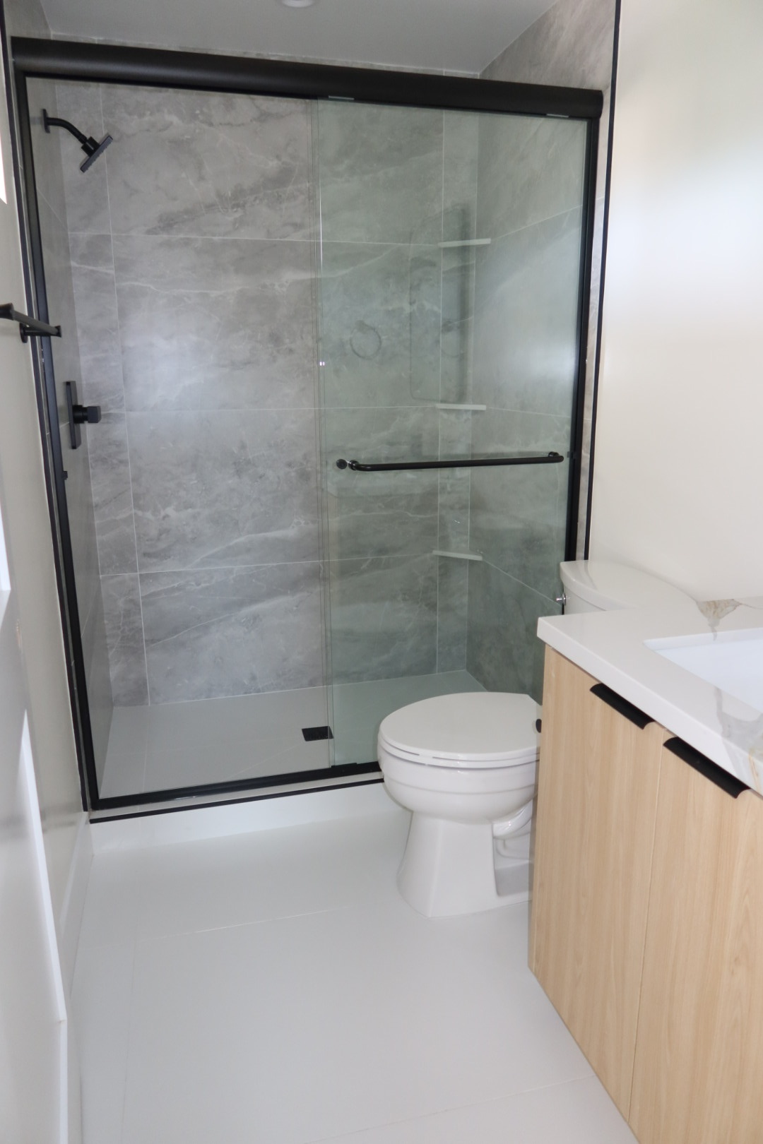 Modern bathroom with glass shower enclosure